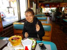 Customer enjoying the famous Taco Salad at Franksville Restaurant in Chicago