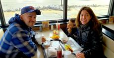 Family enjoying lunch at Franksville Restaurant in Chicago