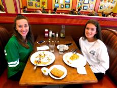 Friends enjoying breakfast at Georgie V's Pancakes & more in Northbrook