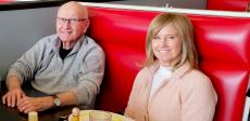 Family enjoying lunch at Gus' Diner in Rolling Meadows
