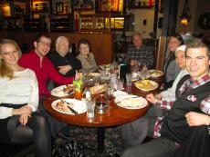 Family enjoying dinner at Johnny's Kitchen and Tap in Glenview