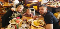 Family enjoying breakfast at Lumes Pancake House in Chicago