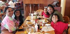 Family enjoying breakfast at Lumes Pancake House in Chicago
