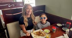 Mother and son enjoying breakfast at Maple Butter Cafe in Plainfield