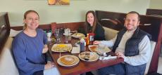 Friends enjoying breakfast at Maple Butter Cafe in Plainfield