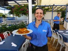 Friendly server at Mykonos Greek Restaurant in Niles
