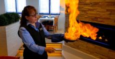 Serving the flaming Saganaki at Mykonos Greek Restaurant in Niles