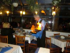 Serving the flaming Saganaki at Mykonos Greek Restaurant in Niles... OPA!