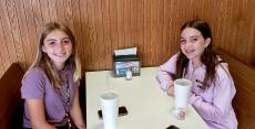 Friends enjoying soft drinks at Nick's Drive In Restaurant Chicago