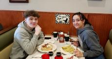 Friends enjoying breakfast at Niko's Breakfast Club in Romeoville