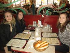 Friends enjoying lunch at Omega Pancake House in Downers Grove