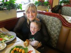 Mother and son enjoying lunch at Omega Restaurant & Pancake House in Downers Grove