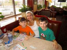 Mom and sons enjoying breakfast at Omega Restaurant & Pancake House in Downers Grove