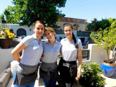 Friendly staff on the outdoor patio at Plateia Mediterranean Kitchen & Bar in Glenview