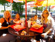 Family enjoying lunch at Plush Pup Gyros in Chicago