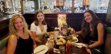 Family enjoying dinner at Rose Garden Cafe in Elk Grove Village