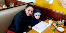 Mom and son enjoying lunch at Tasty Waffle Restaurant in Romeoville