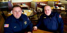 Police officers enjoying lunch at Tasty Waffle Restaurant in Romeoville