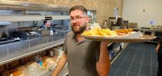 Friendly server at Tasty Waffle Restaurant in Romeoville