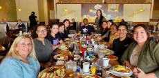 Friends enjoying lunch at Tasty Waffle Restaurant in Romeoville