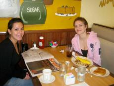 Friends enjoying breakfast at Tasty Waffle Restaurant in Romeoville